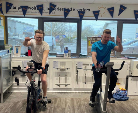 Callum completing the furthest 30-minute distance during the charity cycling challenge