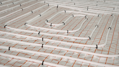 Water underfloor heating pipework installed as part of a low temperature heating system